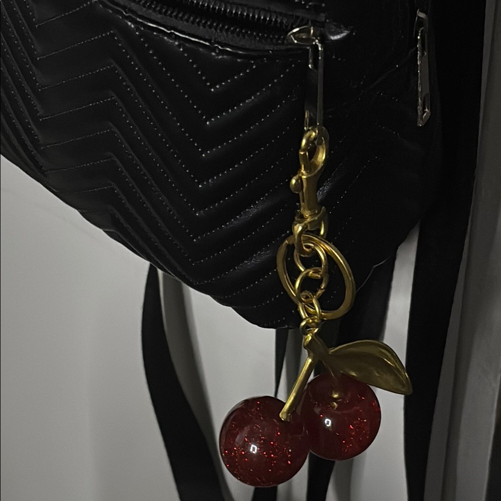 Red glittery cherry bag charm